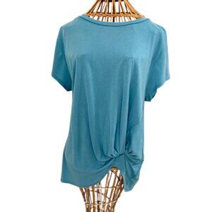 Botanique aqua knit top with ruched waist.